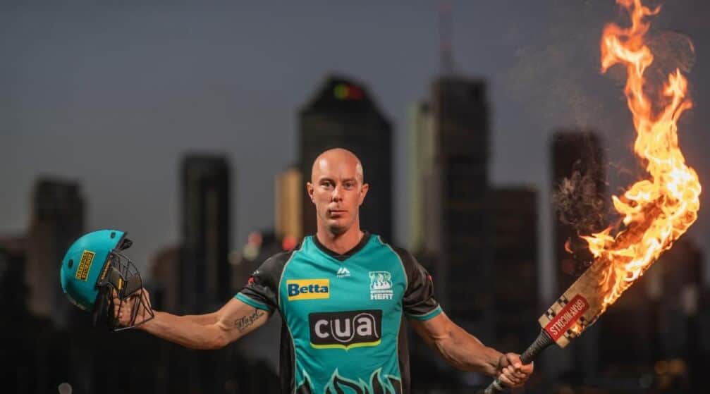 Chris Lynn of Brisbane Heat holds a flaming bat. He's considered one of the best Big Bash players of all time